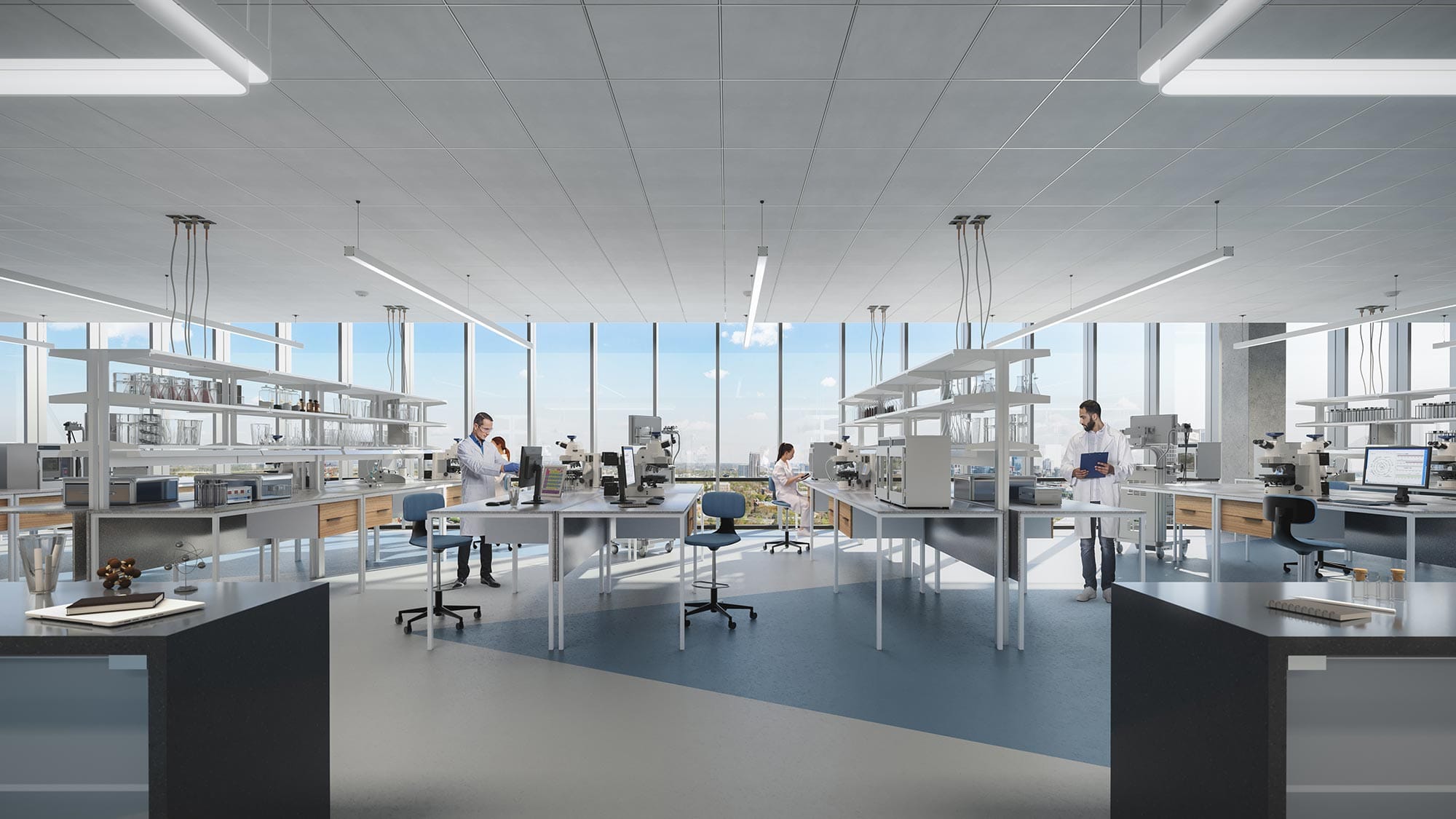 Scientists working in open concept lab space with city views