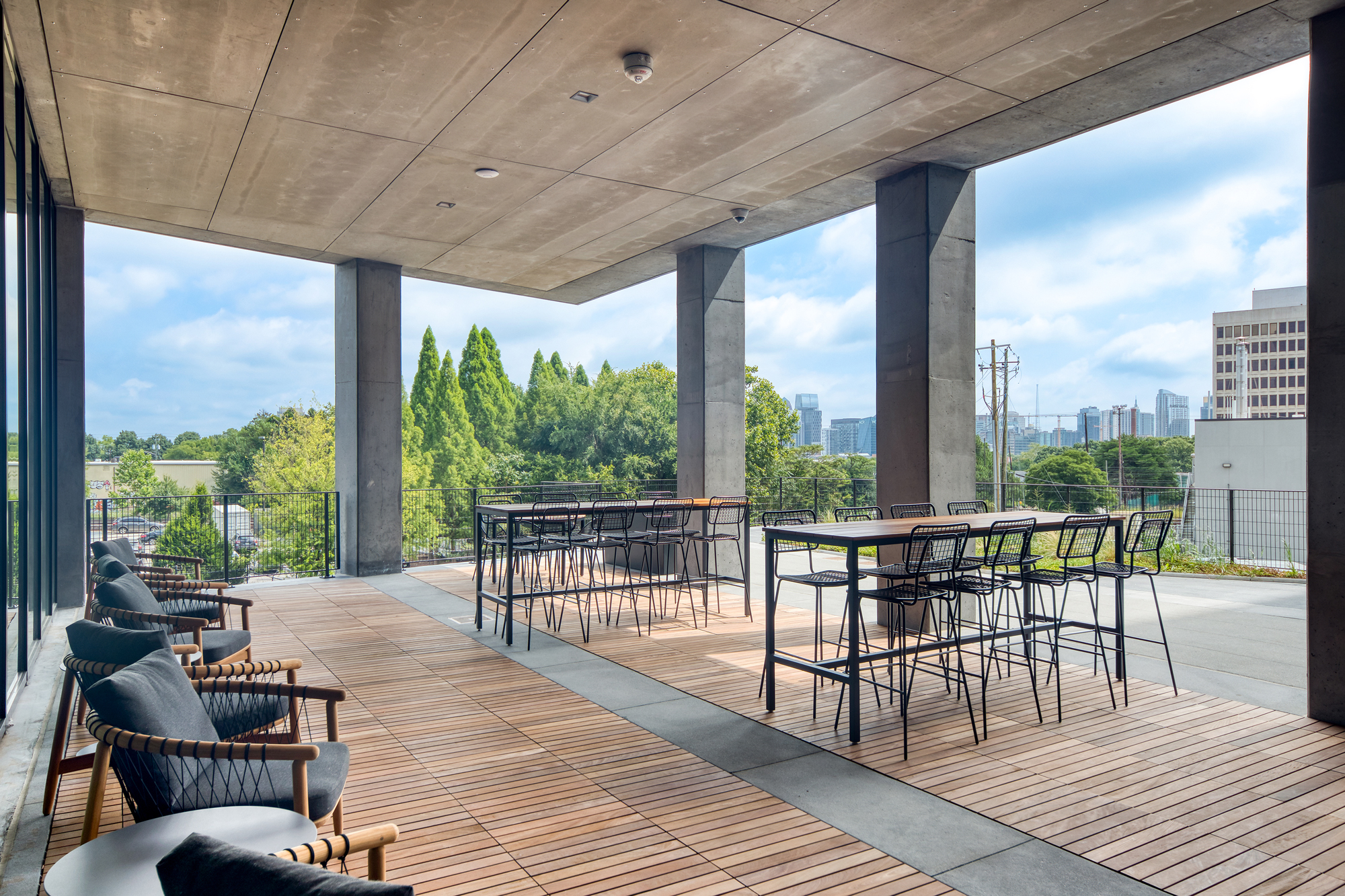 Covered area of open air terrace with city views
