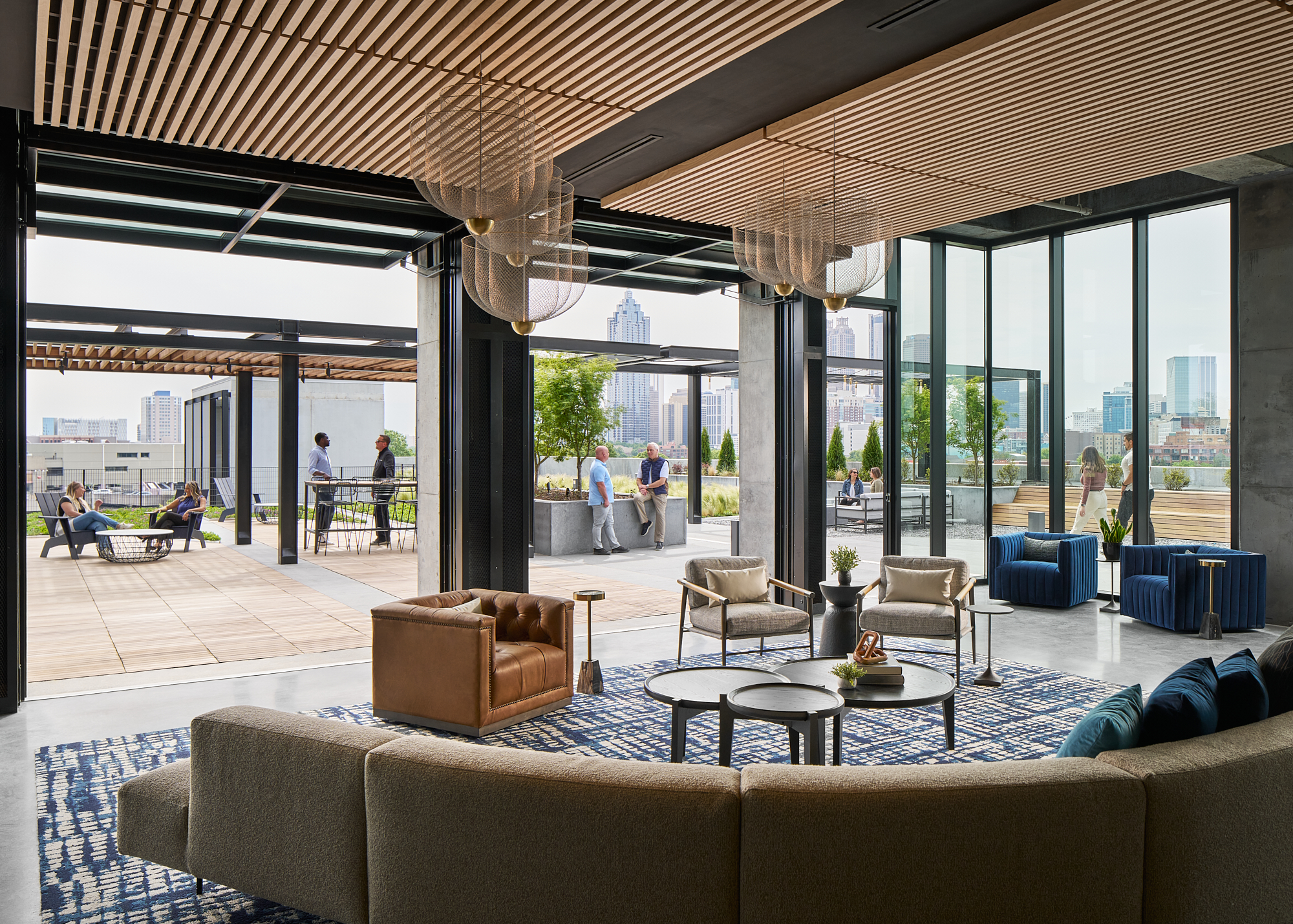 Busy indoor/outdoor terrace with downtown Atlanta views